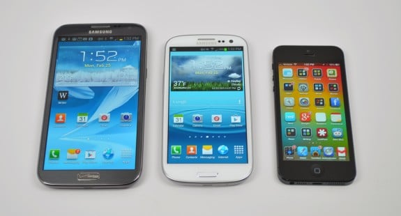 The iPhone 5 next to the Galaxy S3 and Galaxy Note 2.