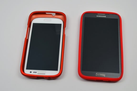 The Samsung Galaxy S3 and Galaxy Note 2 inside Galaxy S4 cases.