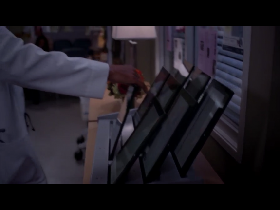 A fleet of Surface tablets. Despite the number of tablets on use at the hospital, viewers may not be easily able to tell that it's a Microsoft Surface. 