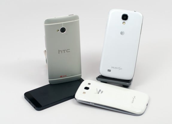 The Samsung Galaxy S4 and HTC One are likely behind a spike in Galaxy and iPhone trade-ins.