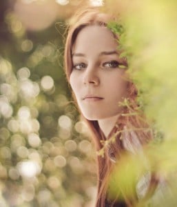 Portrait photography focuses on the human face so you blur out the background with aperture control. Image from DesignYouTrust.com