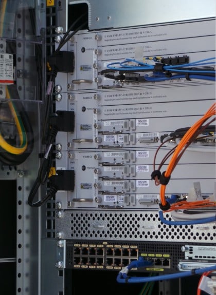 Each rack inside the box handles a specific frequency. Additional racks can be added when more spectrum gets acquired.