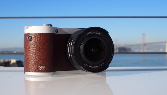 The 10mm lens attached to a Samsung NX300 camera in brown. 