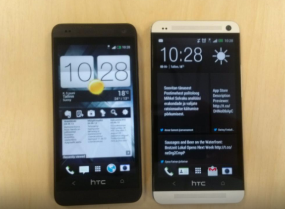 The HTC One Mini, left, next to the HTC One. 
