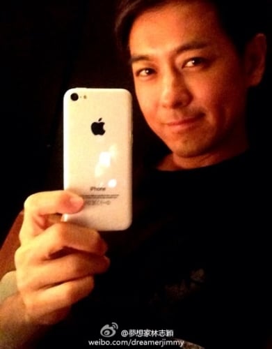 Taiwanese pop star and race car driver Jimmy Lin with the iPhone 5C.