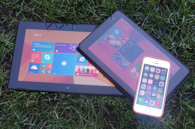 Testing displays under bright sunlight, but in the shade. From left to right: Nokia Lumia 2520, Dell Venue 8 Pro, iPhone 5s