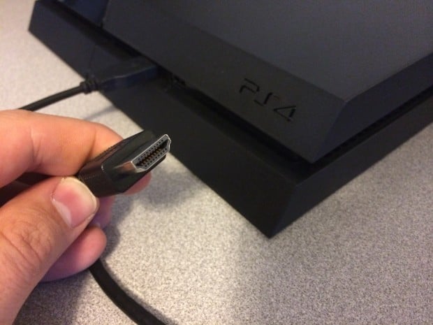 Plug the HMDI cable into the PS4 to get started with setup.