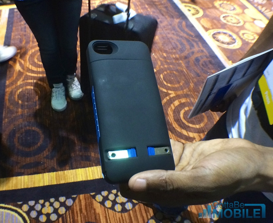 This iPhone 5s case has a built-in plug to charge at any outlet, without a cord.