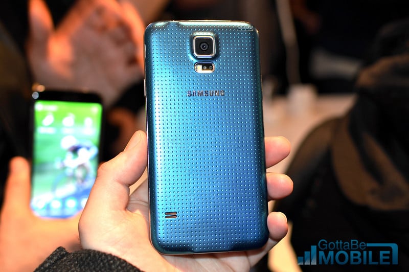 The Galaxy S5 design includes a removable back with a new dimpled design.