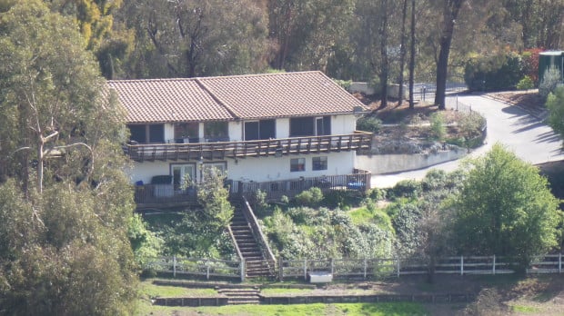 Zooming into a house at 21X zoom of the above scene. 
