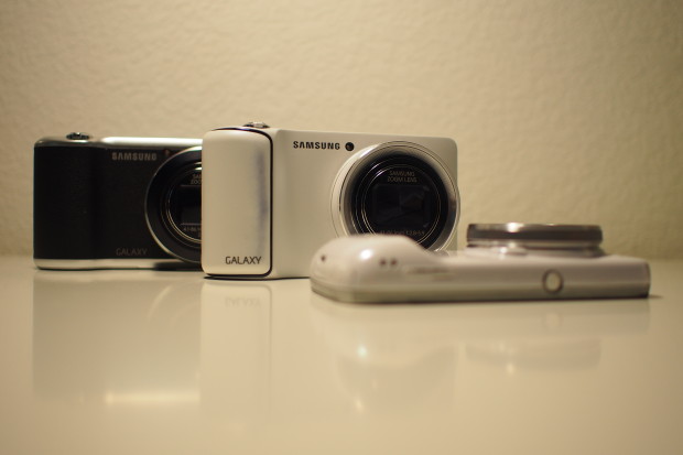 From rear to front: Galaxy Camera 2 (black), Galaxy Camera, Galaxy S4 Zoom