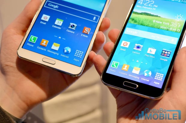 The new home button on the Galaxy S5 (right) is also a fingerprint reader.