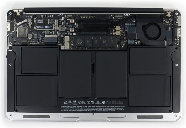 The 11.6-inch MacBook Air internals are already paced tightly, but removing the fan and using flexible battery tech could free up some space. Image via iFixit.