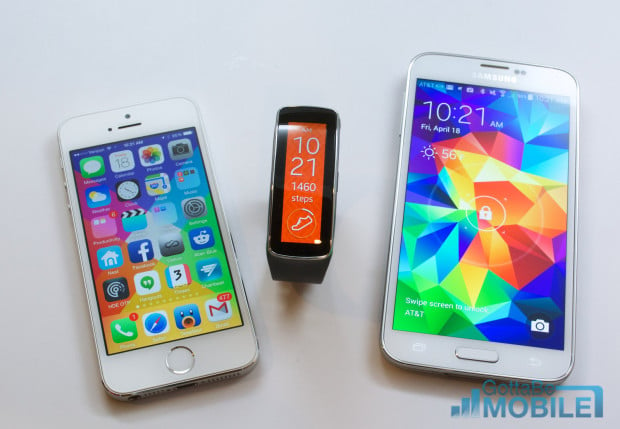 The Galaxy S5 can connect to a Gear Fit, but there is no iWatch yet.
