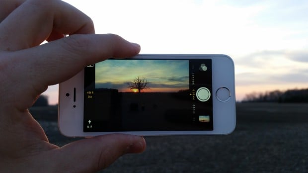 There is no live HDR mode on the iPhone 5s so you need to guess what you will see. 