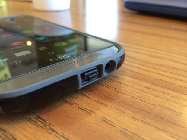 qi-enabled charging film plugged into htc one micro-usb port