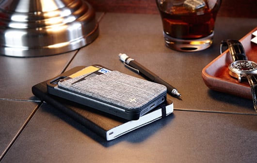 This case includes a slim wallet that attaches to the iPhone and works alone as well.