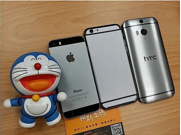 The mockup iPhone 6 vs HTC One M8 shows a similar size, but a shorter iPhone.