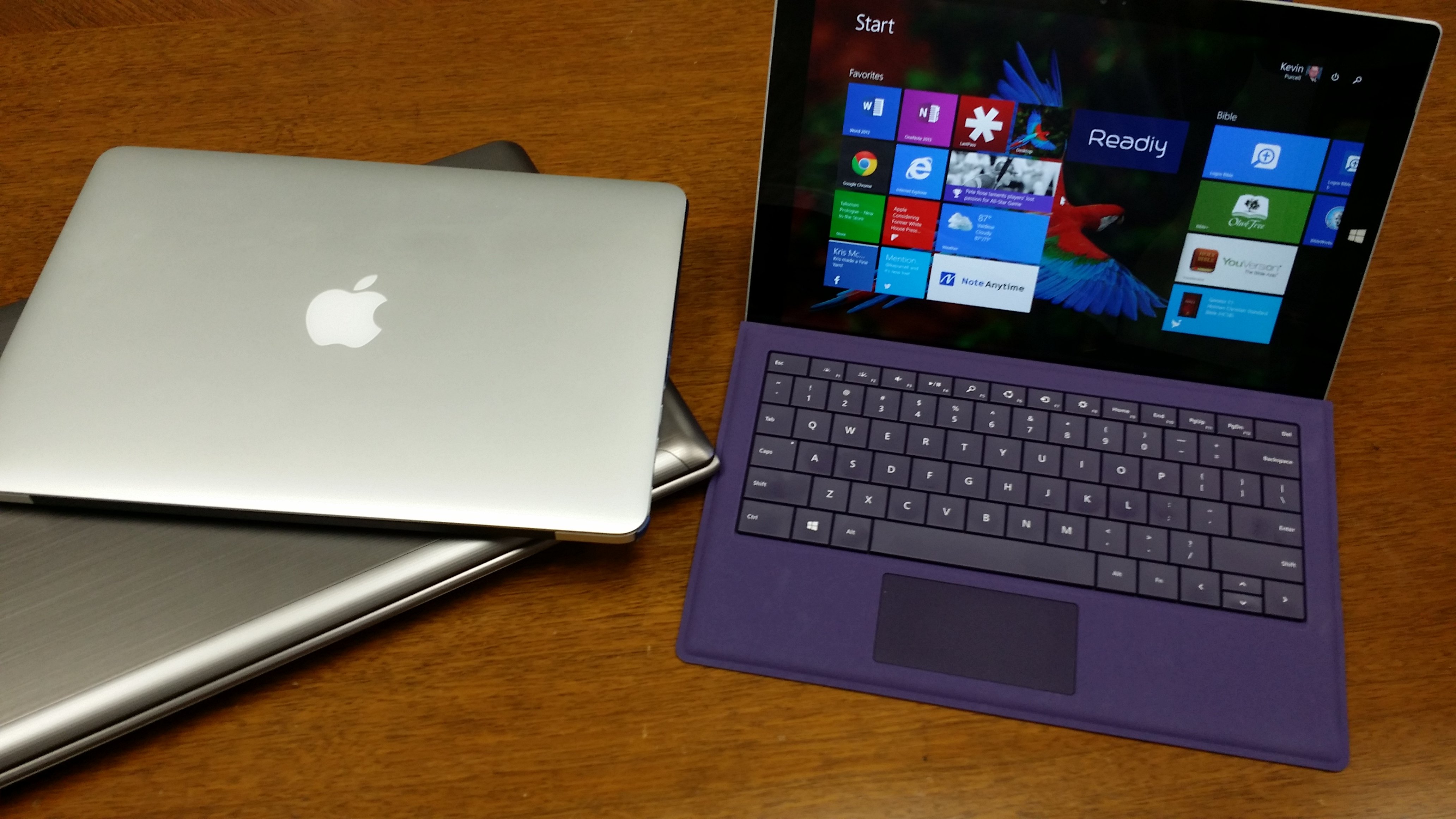 microsoft surface pro 3 and two other laptops