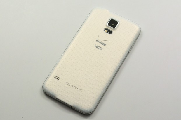 The Galaxy S5 design includes a soft touch dimpled back.