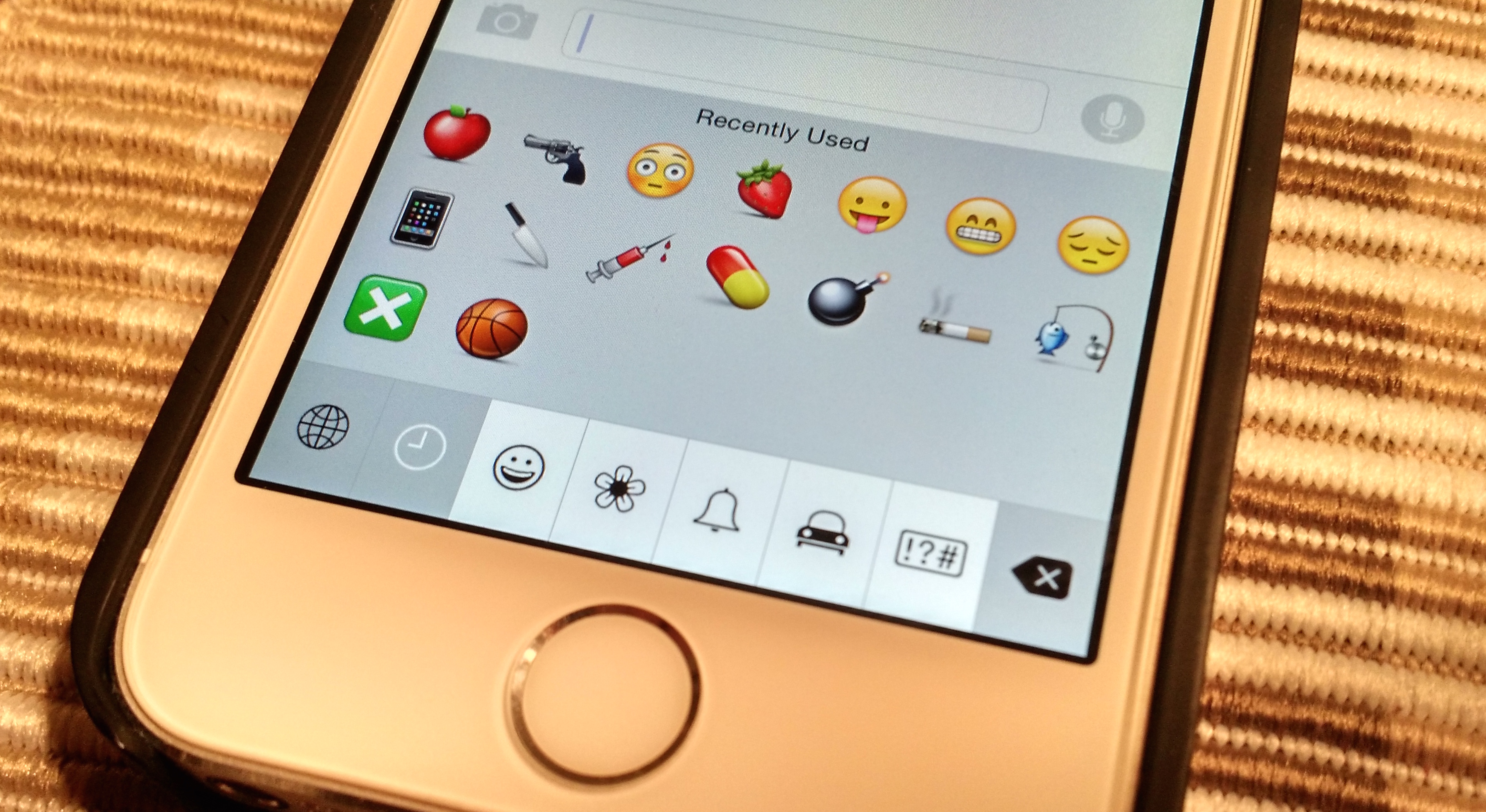 Turn on the iOS 8 Emoji keyboard.