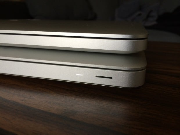 The difference in thickness between the Retina MacBook Pro (top) and the $1,099 MacBook Pro.