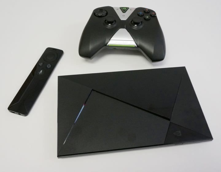 nvidia shield tv with remote and game controller
