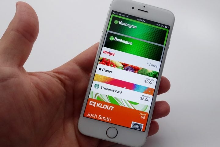 You can access Apple Wallet with a double click of the home button when the iPhone is locked.