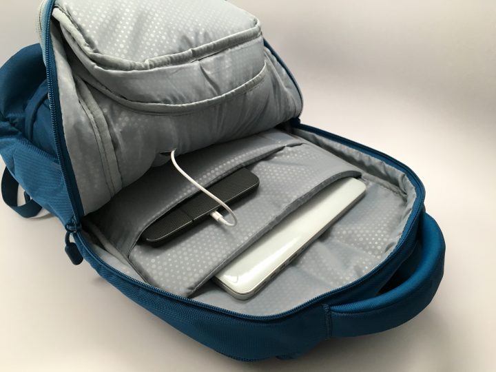 Plenty of pockets, and options to run cords to charge your devices. 
