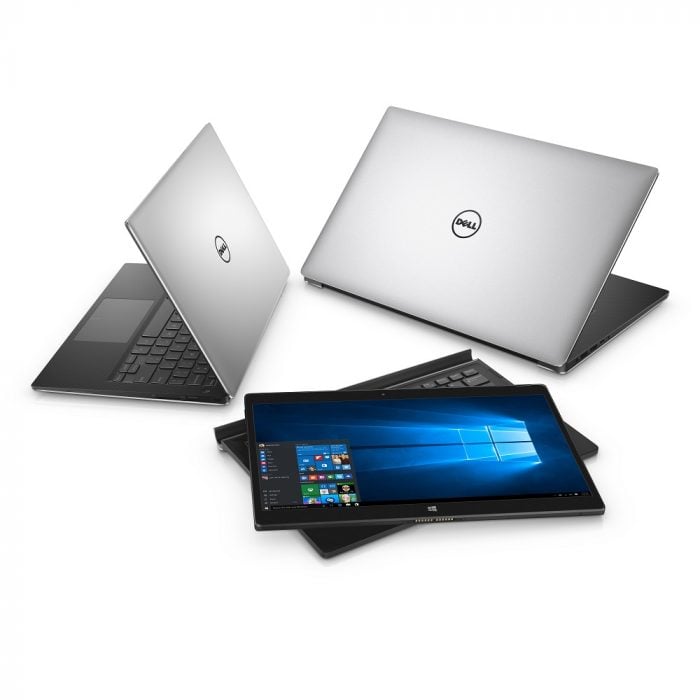 Three Dell XPS notebook computers arranged in a circle. An XPS 13 (Model 9350, Dino 2 XPS) notebook is on the far left, open 45 degrees facing back left. An XPS 12 (Model 9250) 2-in-1 (Veneno) sits in the middle, with the tablet screen resting on top of a keyboard attachment and an XPS 15 (Model 9550, Berlinetta XPS) computer is on the far right, open 45 degrees and facing back right.