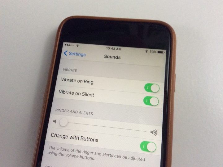 iphone vibrate while ringing How do I silence the iPhone ringer / enter vibrate mode? main image 1