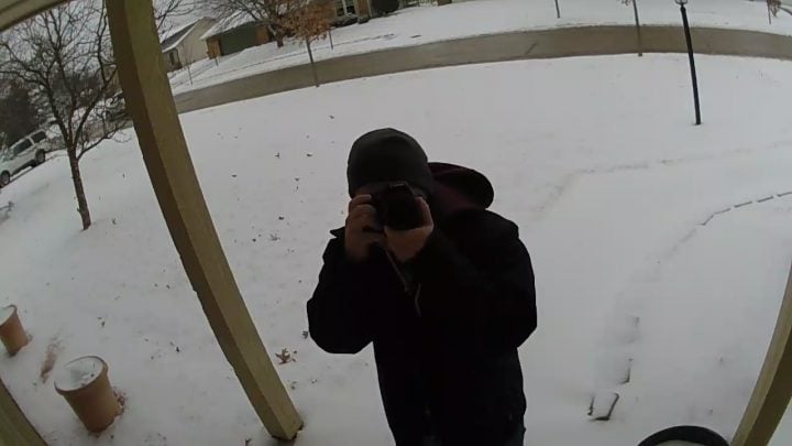 The whiteness of the snow forces the camera's exposure to go way down, making it more difficult to see who's at the door.
