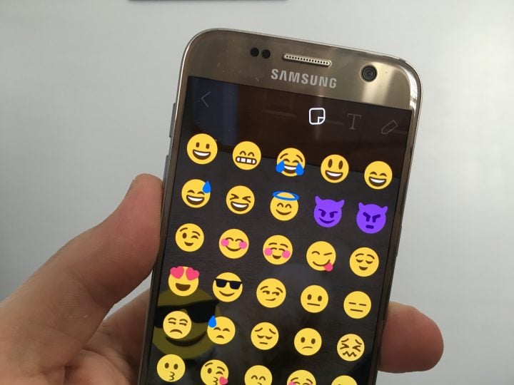 Tap on the sticker icon then choose a sticker for 3D emoji in Snapchat.