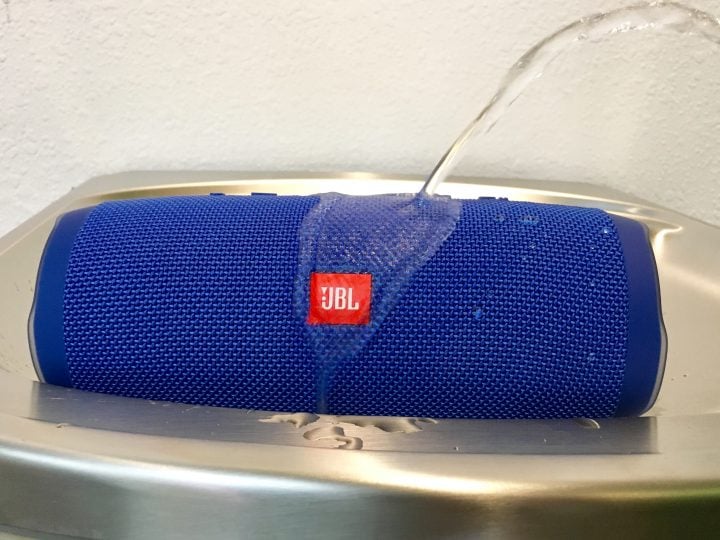 The JBL Charge 3 is waterproof and it can charge your phone. 