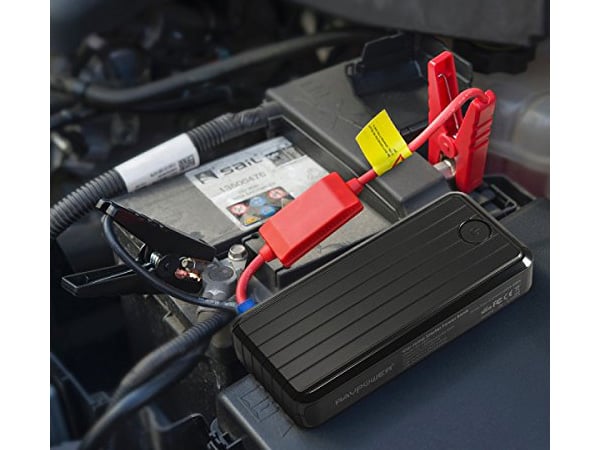 ravpower-portable-car-jump-starter-on-car-battery