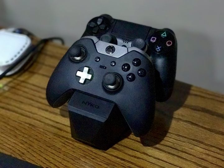 The Nyko Charge Block at home charging a Xbox One and a PS4 controller.