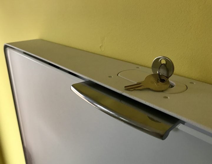 You can lock the wall mounted sit-stand desk.
