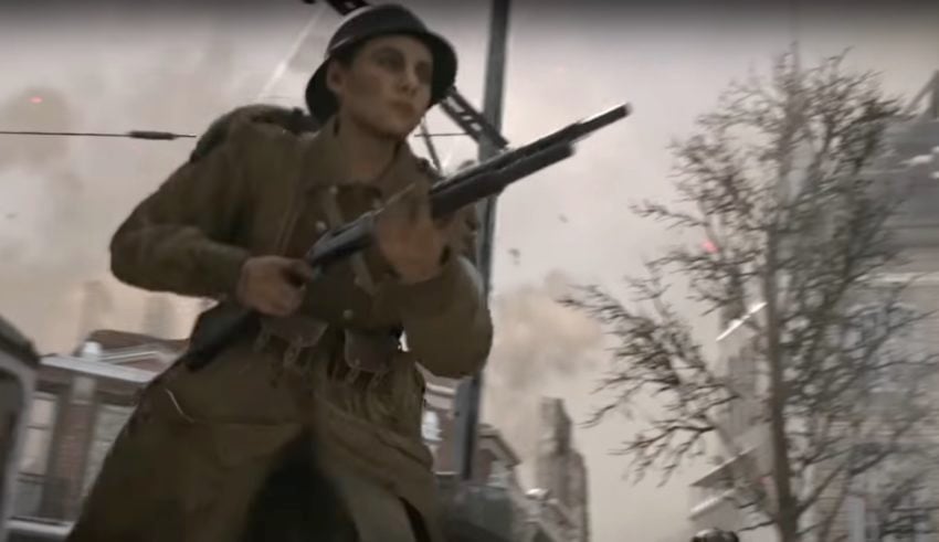 You can hear and see a woman player in the multiplayer trailer.