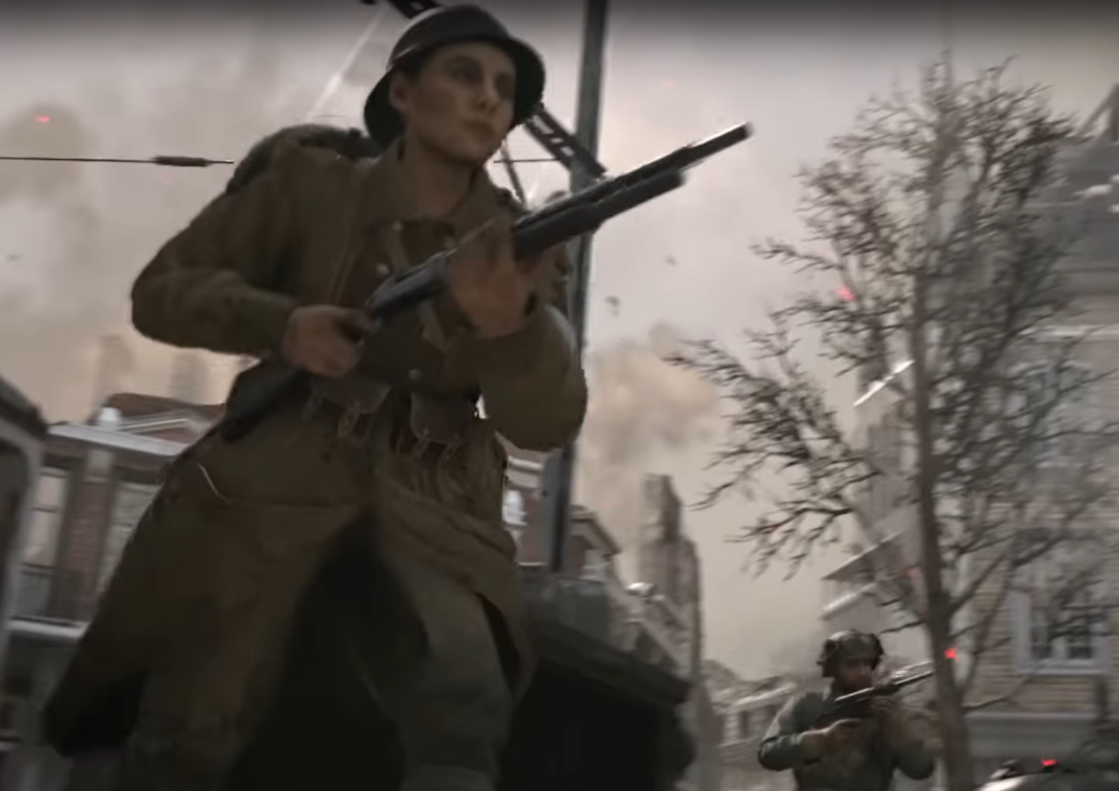 You can hear and see a woman player in the multiplayer trailer.