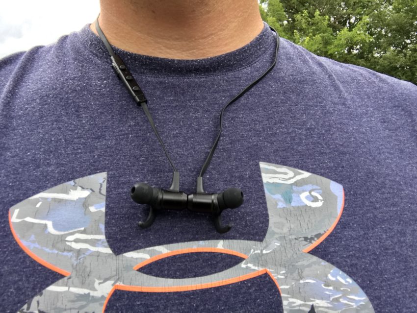 Magnets keep the headphones around your neck when not in use. 