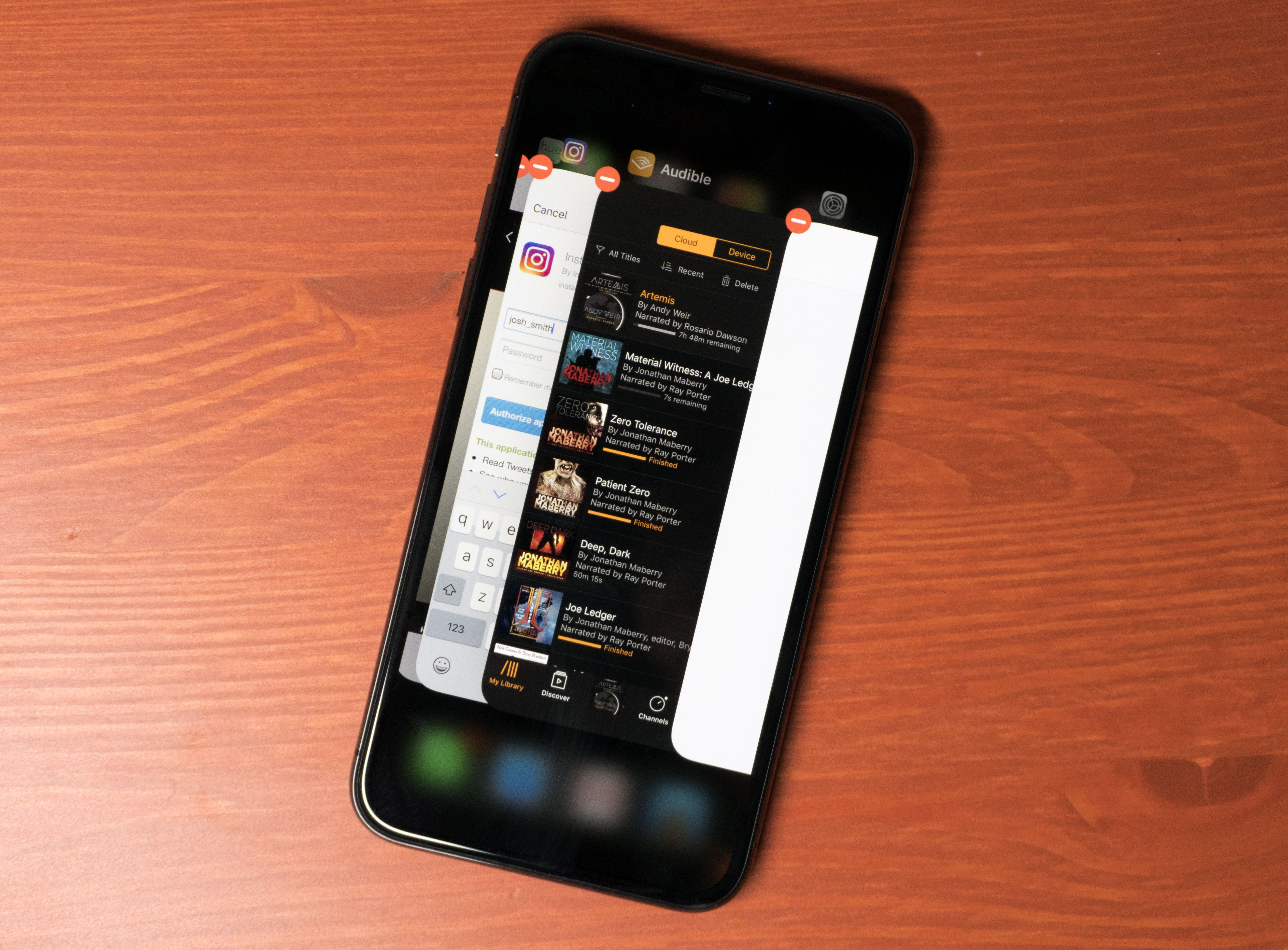 Force close running apps on the iPhone X.