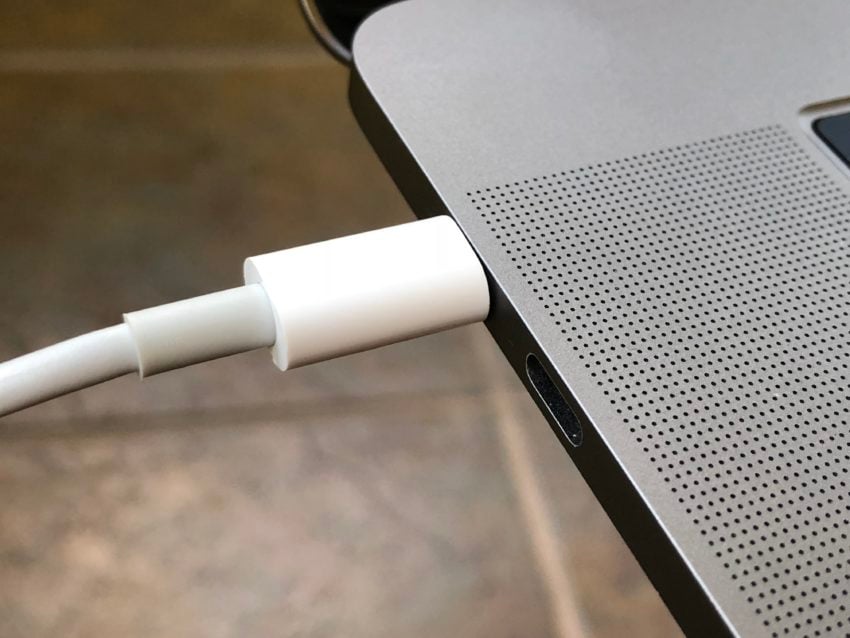 Remove the power cord from your MacBook or MacBook Pro. 