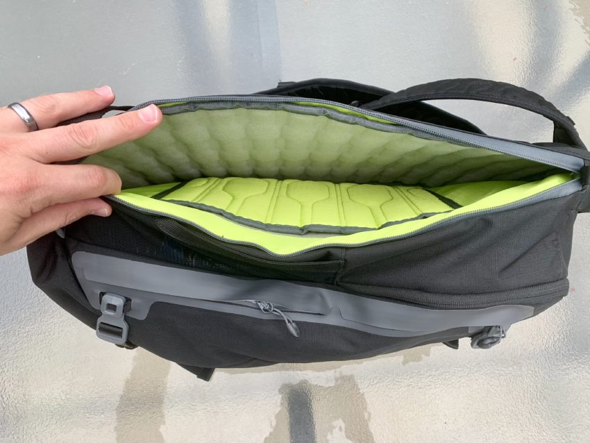 A padded pocket protects up to a 15-inch laptop.