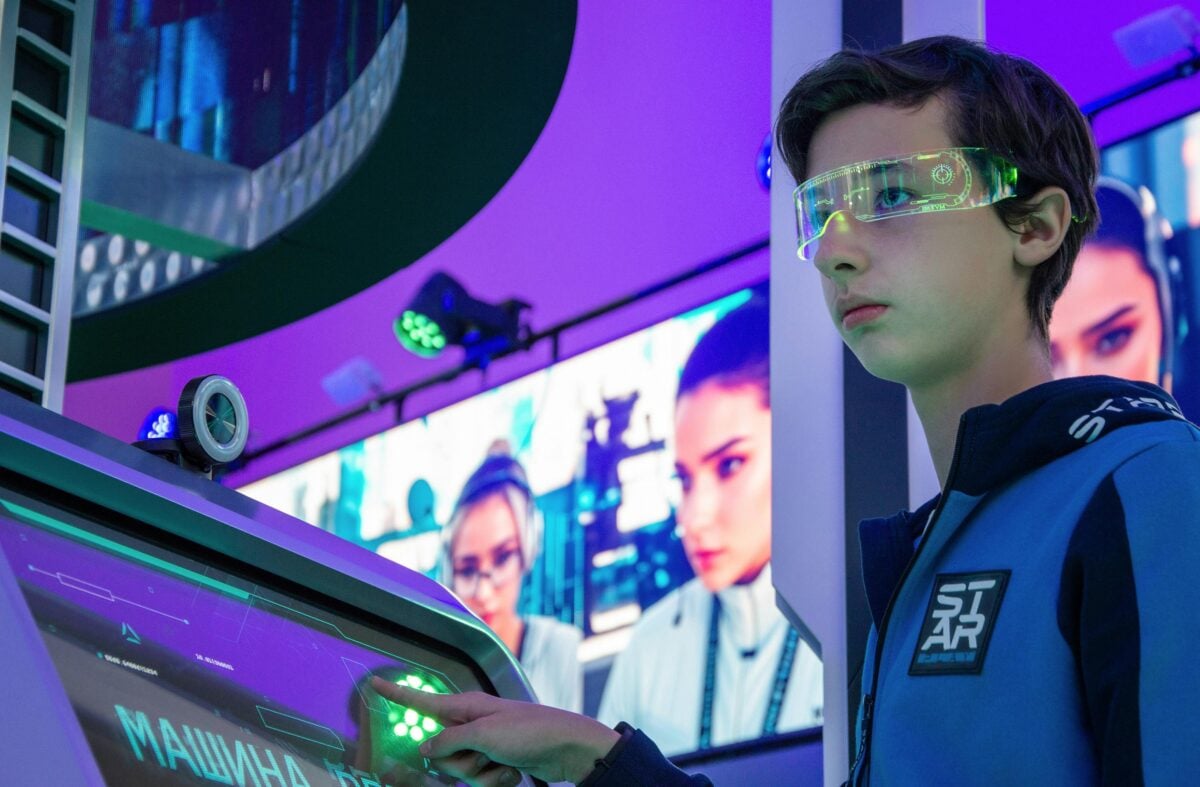 human interacting with advanced digital interface